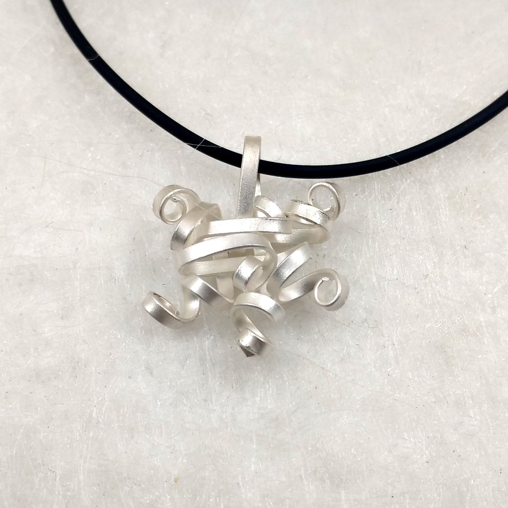 QuaDDaM - Sterling Silver pendant, available in 3 finishes
