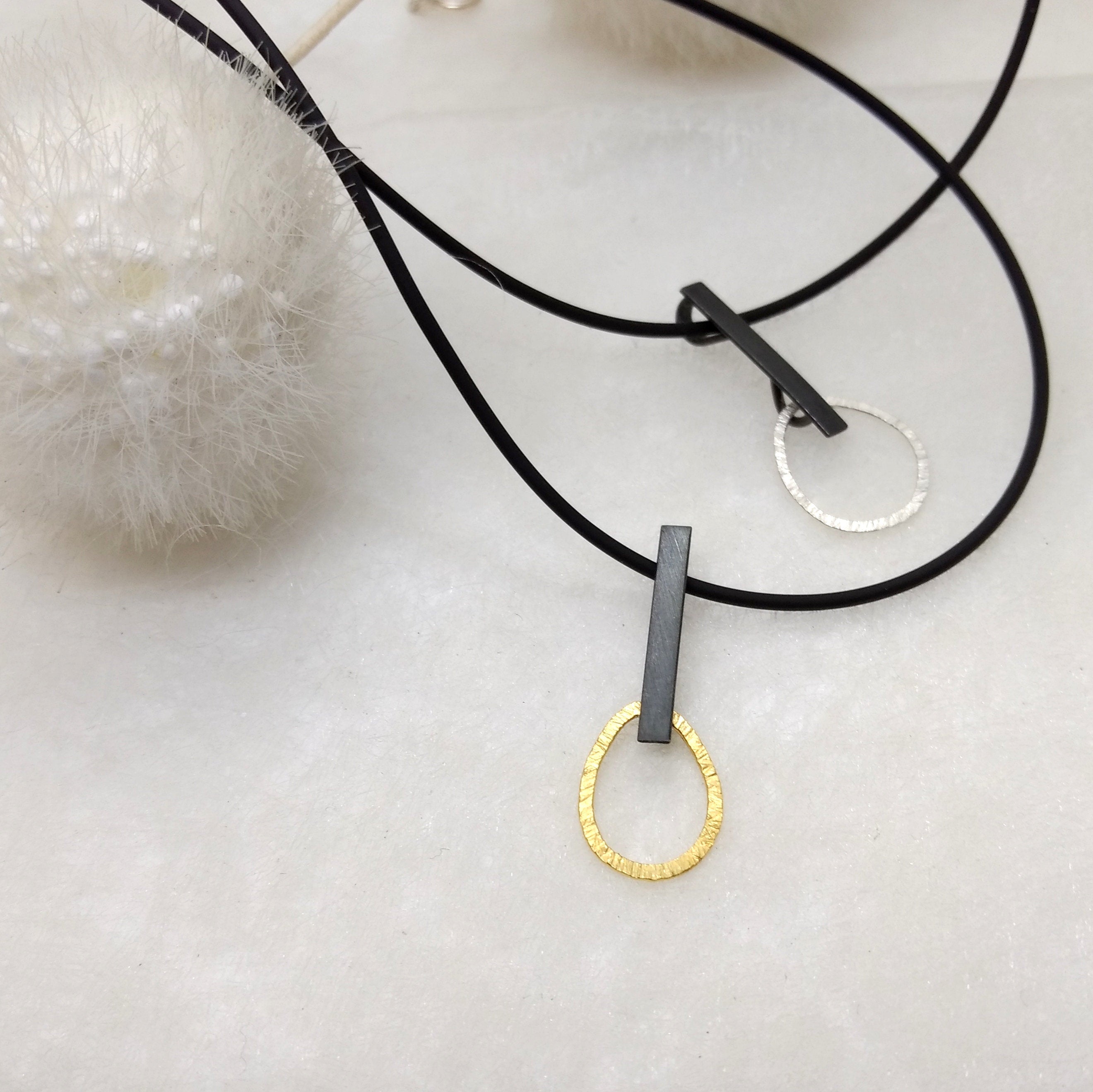 Ai-Ek, small handmade sterling silver pendant in black & white or black & gold combinations