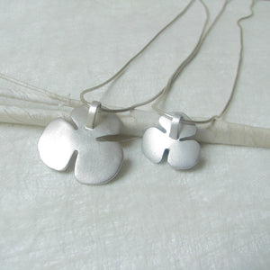 LoRe - Sterling Silver pendant with white pearl, available in 2 finishes
